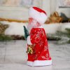 Babbo Natale "cappotto lungo, con albero di Natale" 17 cm